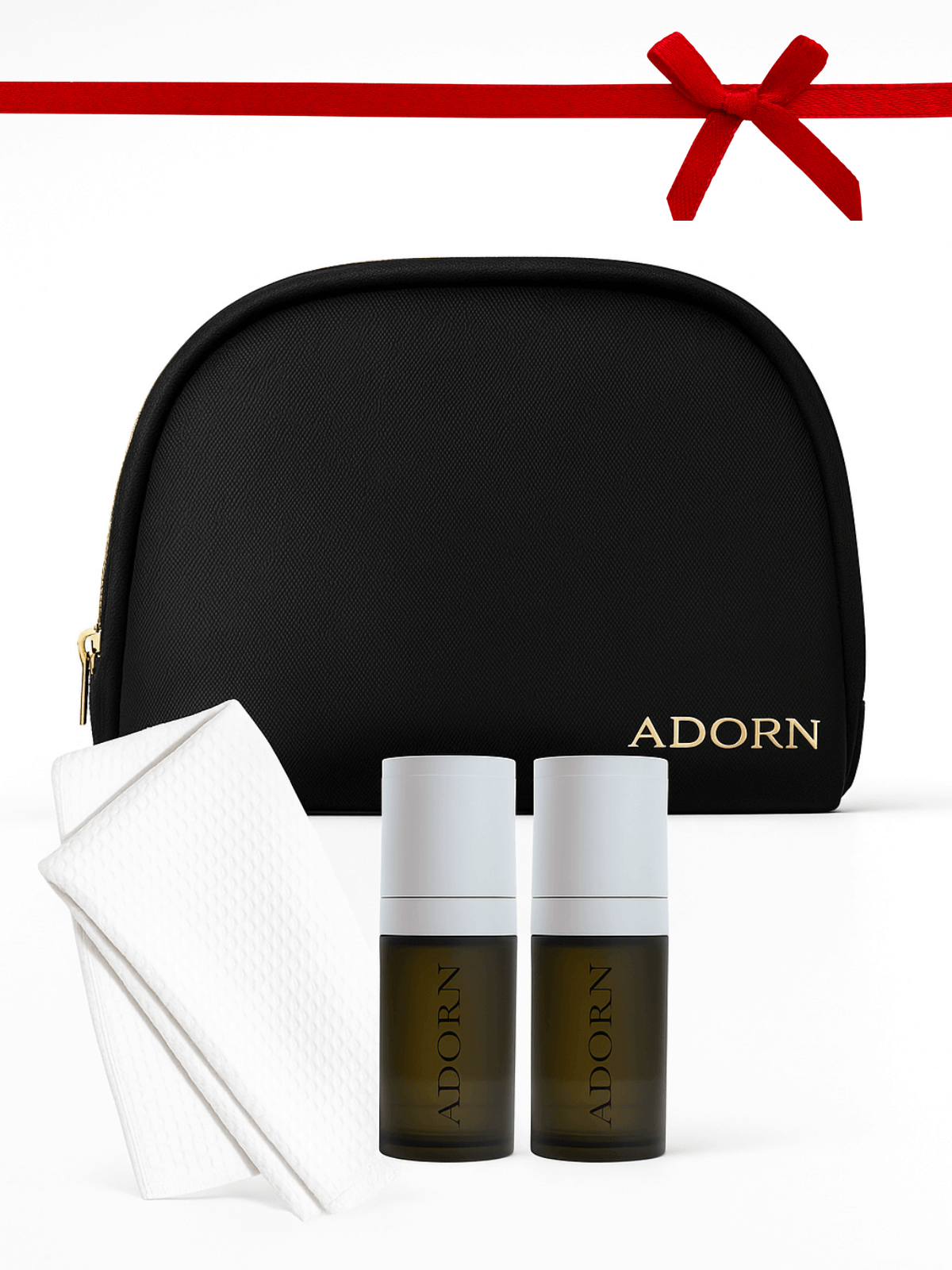Black 'ADORN' cosmetic bag with two bottles and a pouch on a white background
