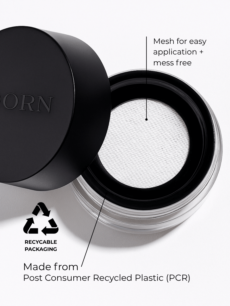 Refillable mineral powder compact with black lid and mesh application feature, highlighting recyclable packaging.