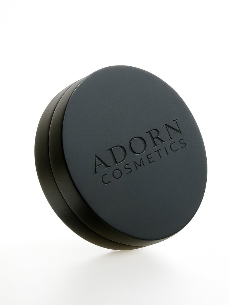 Mineral Makeup compact stack tilted on a white background. Made from biodegradable bamboo. Now available to shop from Adorn Cosmetics online.