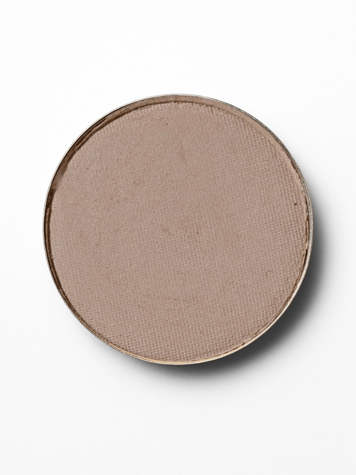Round beige ceramic plate on a white background