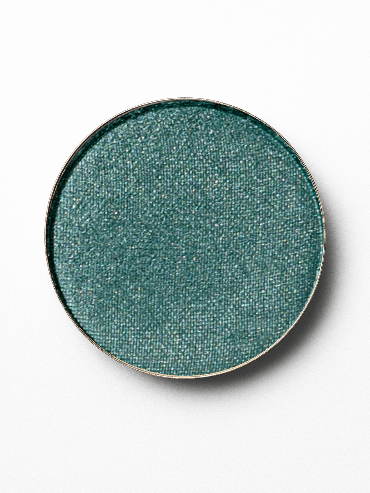 Round green eyeshadow compact on a white background