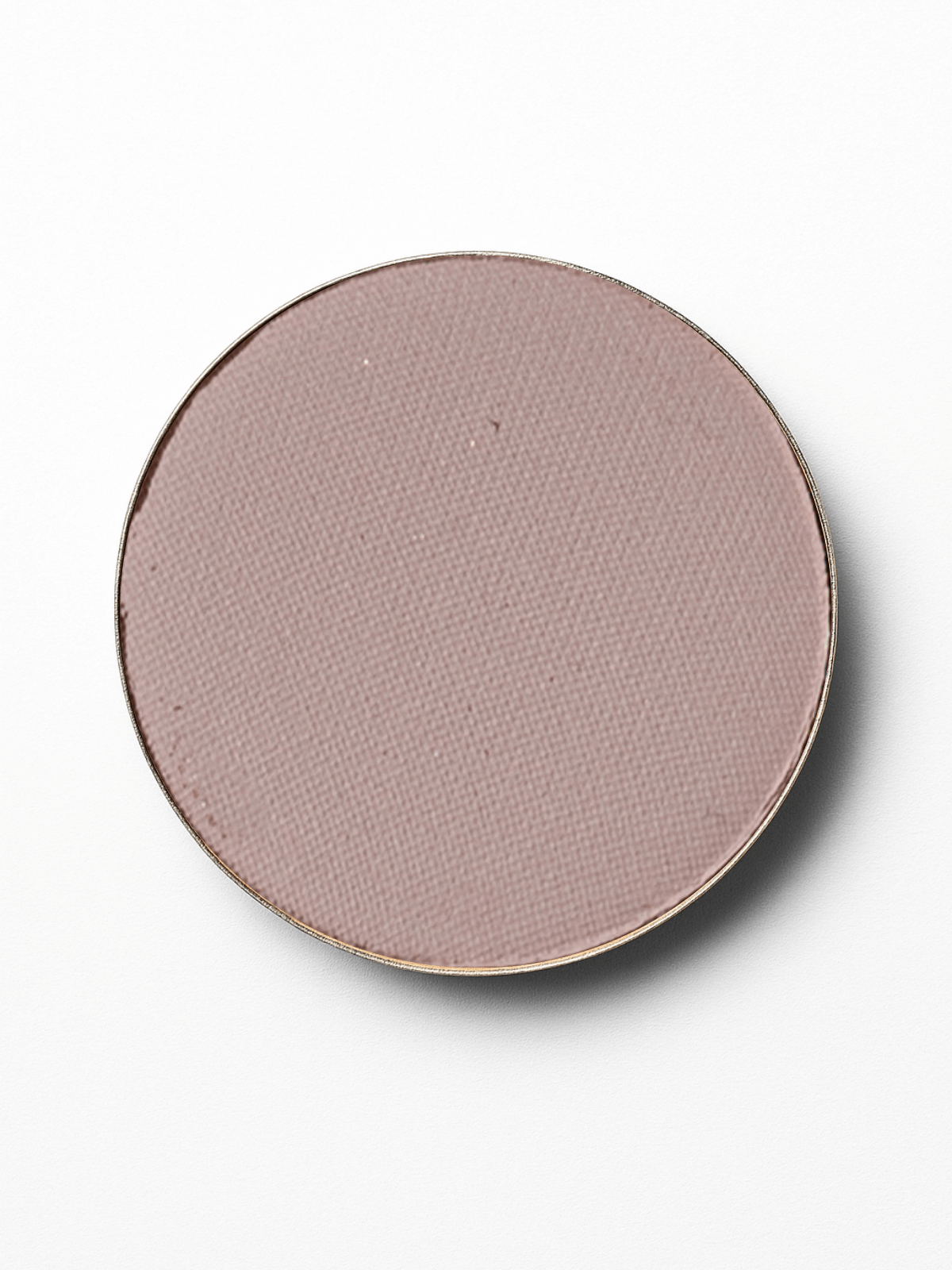 Round pink makeup compact on a white background