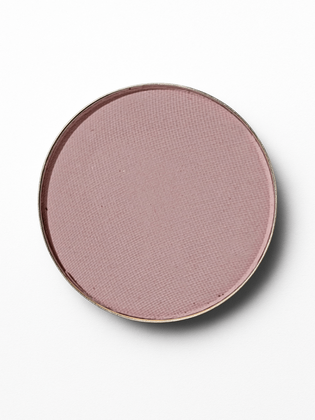 Round pink ceramic plate with a brown rim on a white background