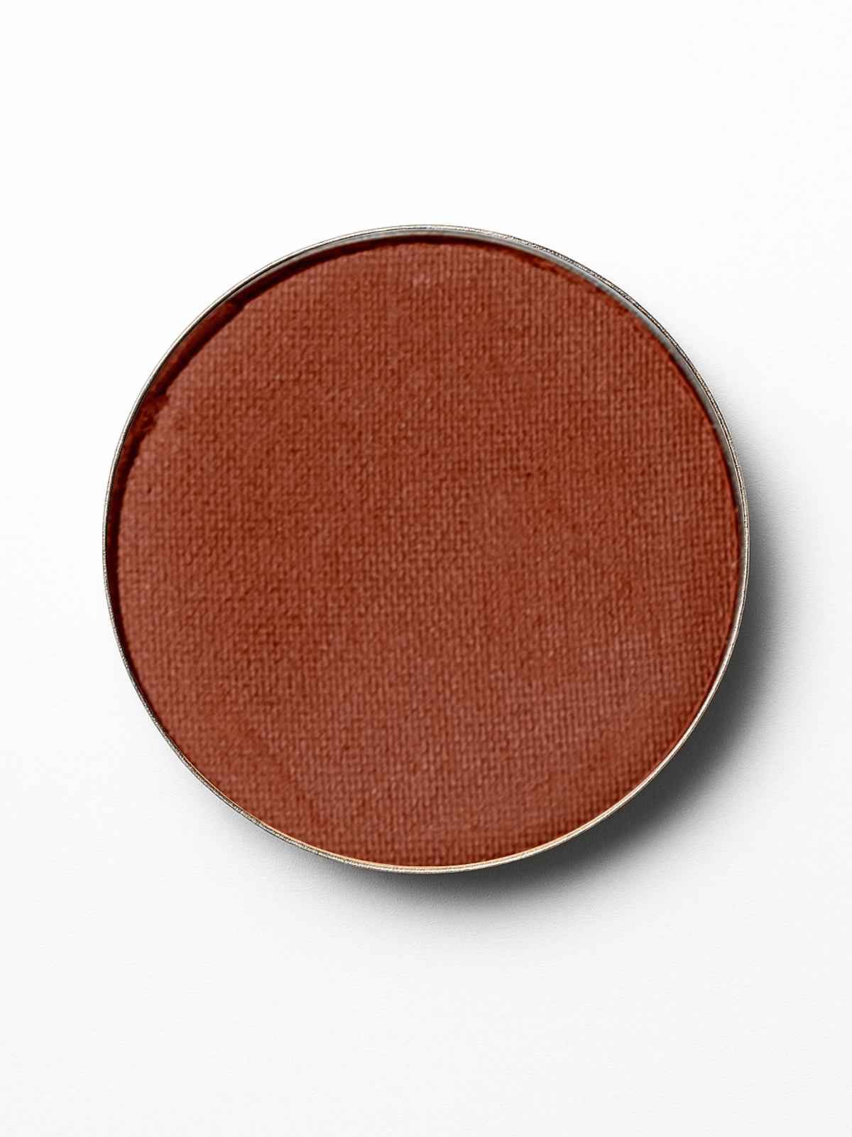 Round brown makeup compact on a white background