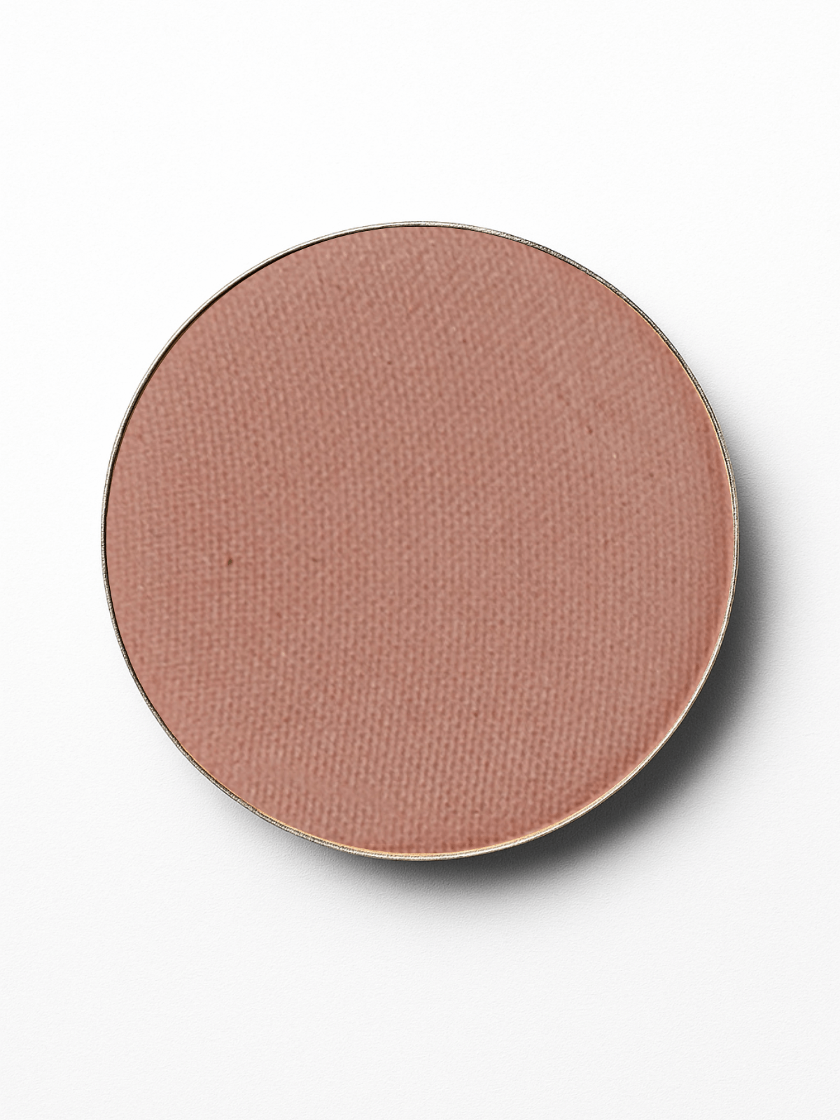 Round blush compact with a soft pink shade on a white background