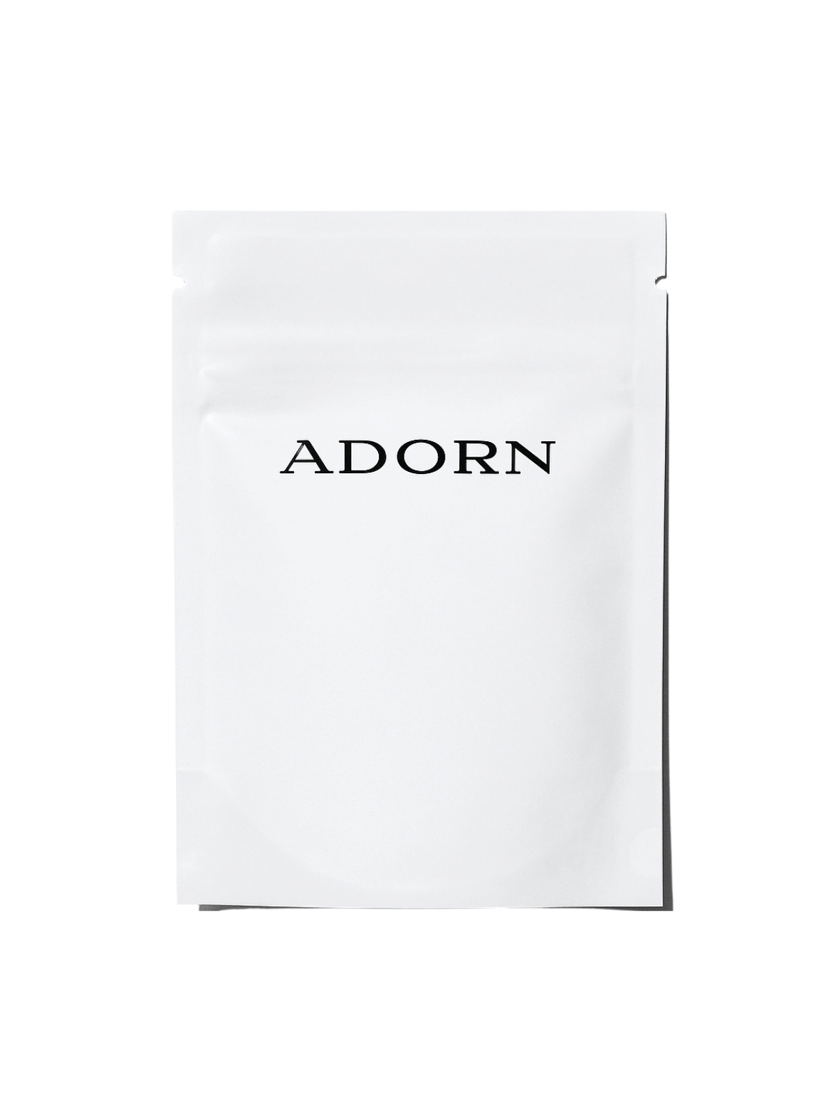 Natural skincare samples Australia on a white background with ADORN label.