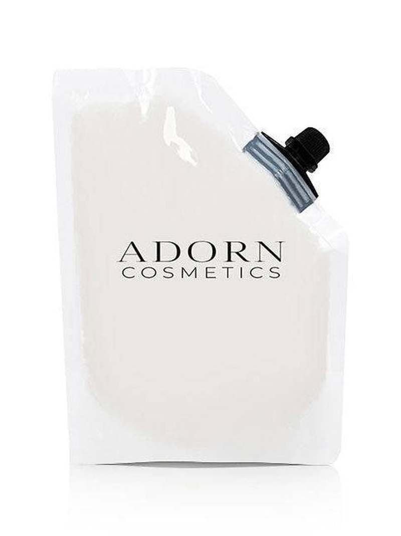 ADORN Niacinamide + Collagen Face Repair Mist refill pouch on a white background.