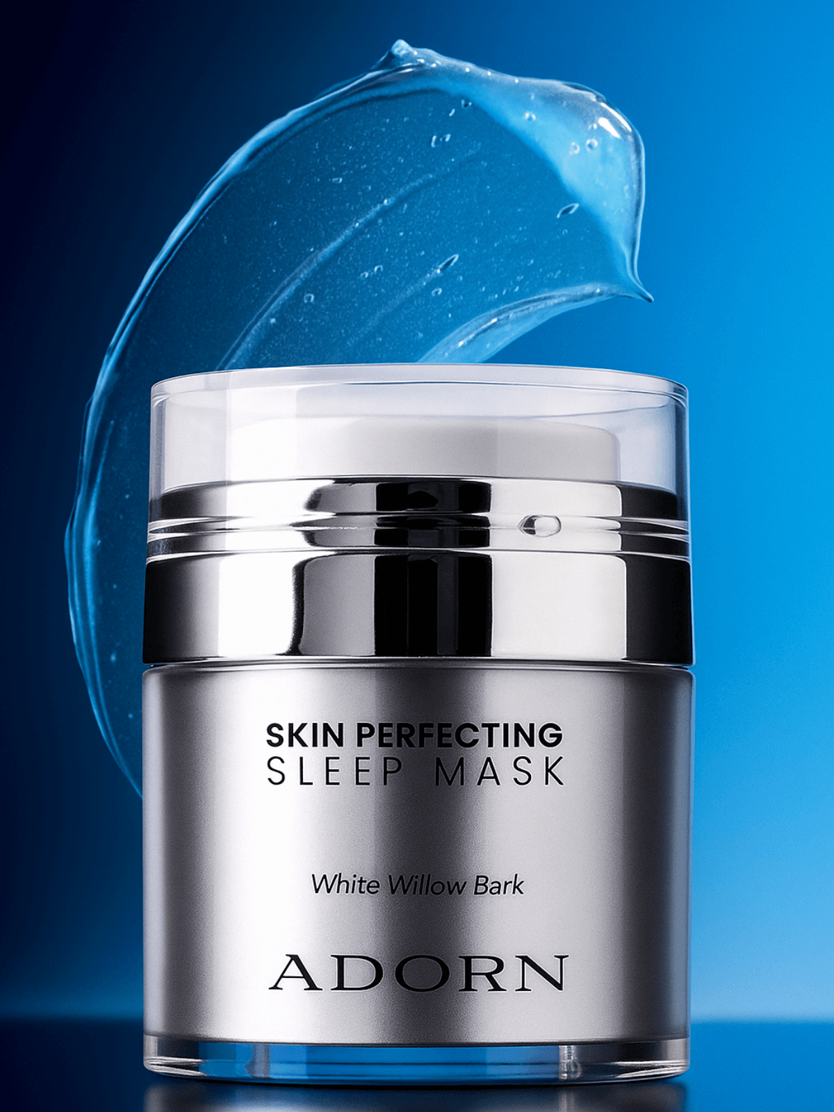 Skincare product jar labeled 'Skin Perfecting Sleep Mask' by 'Adorn' on a blue background