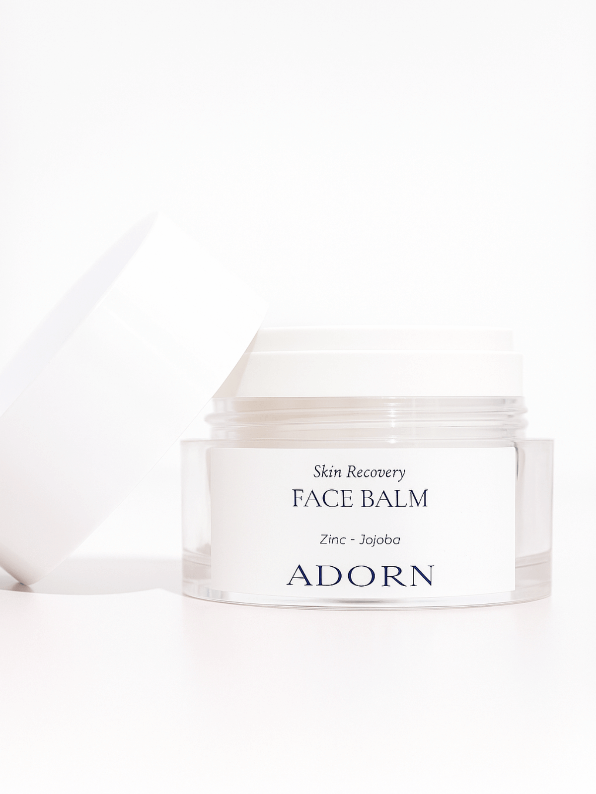 Jar of Adorn's Skin Recovery Face Balm on a white background