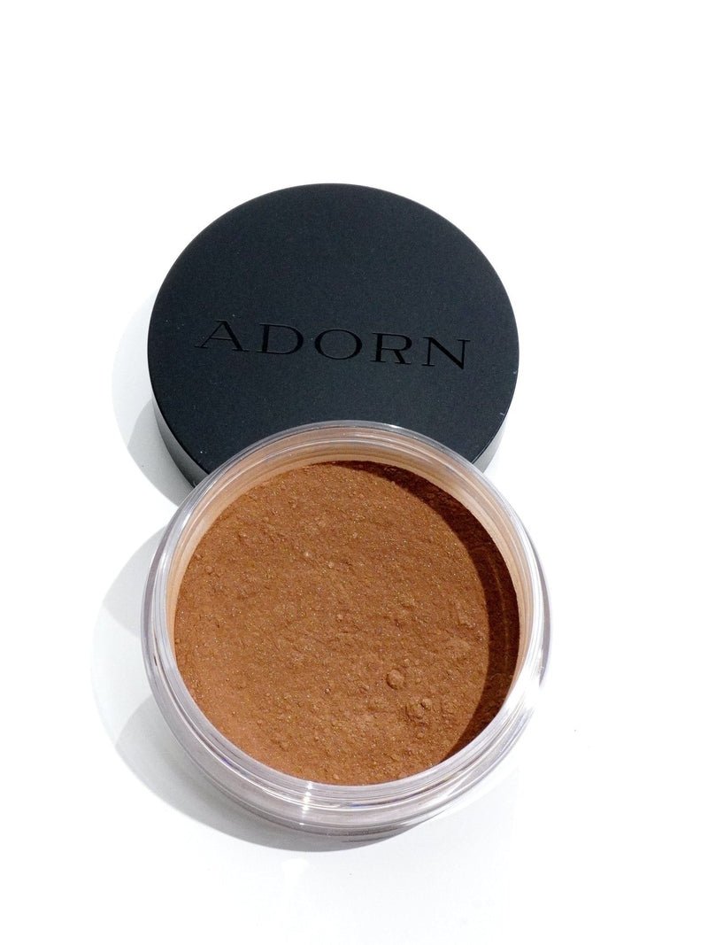 ADORN Mineral SPF 20+ Foundation loose powder for mature skin with lid opened on a white background. featuring a dark skin shade.