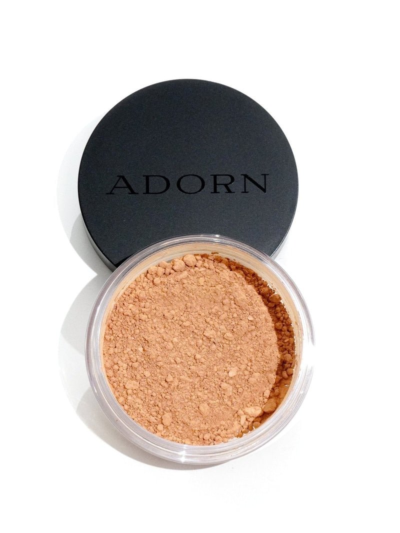 ADORN Mineral SPF 20+ Foundation loose powder for mature skin with lid opened on a white background.