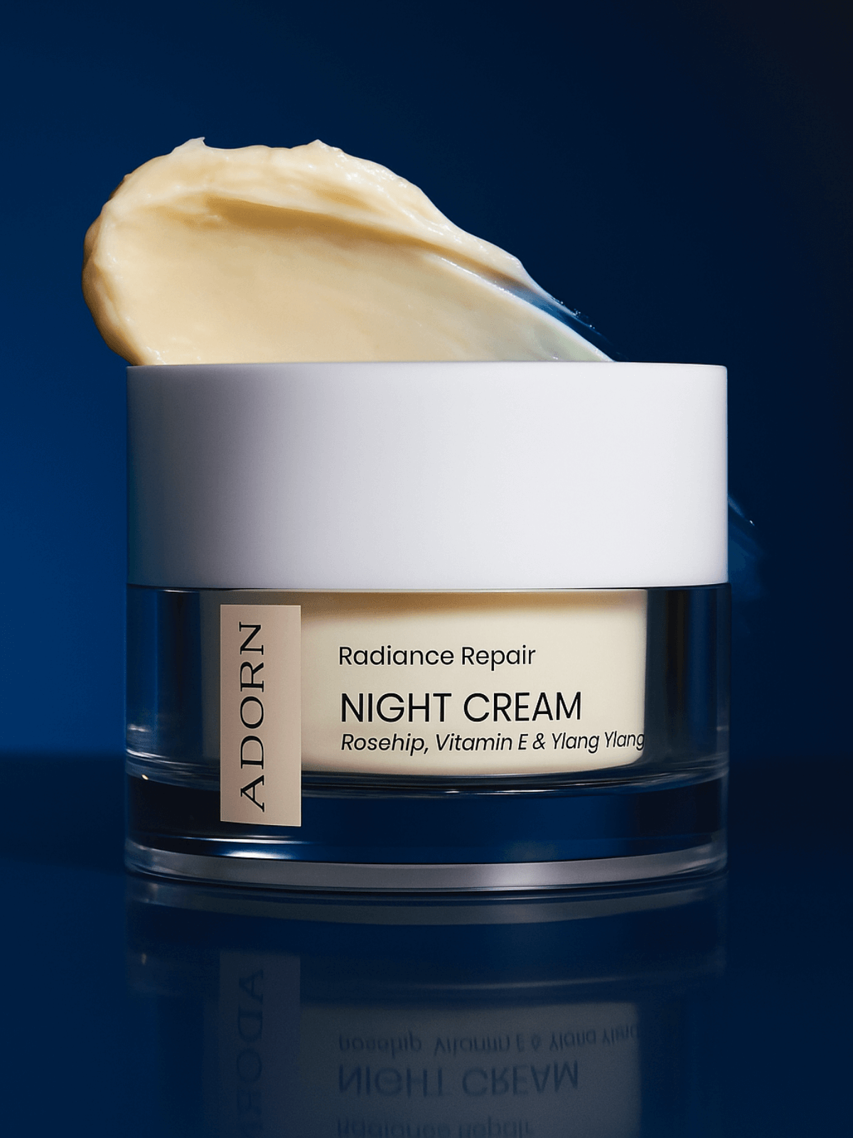 Vitamin E radiance night cream jar on blue background — refillable mature skin moisturiser