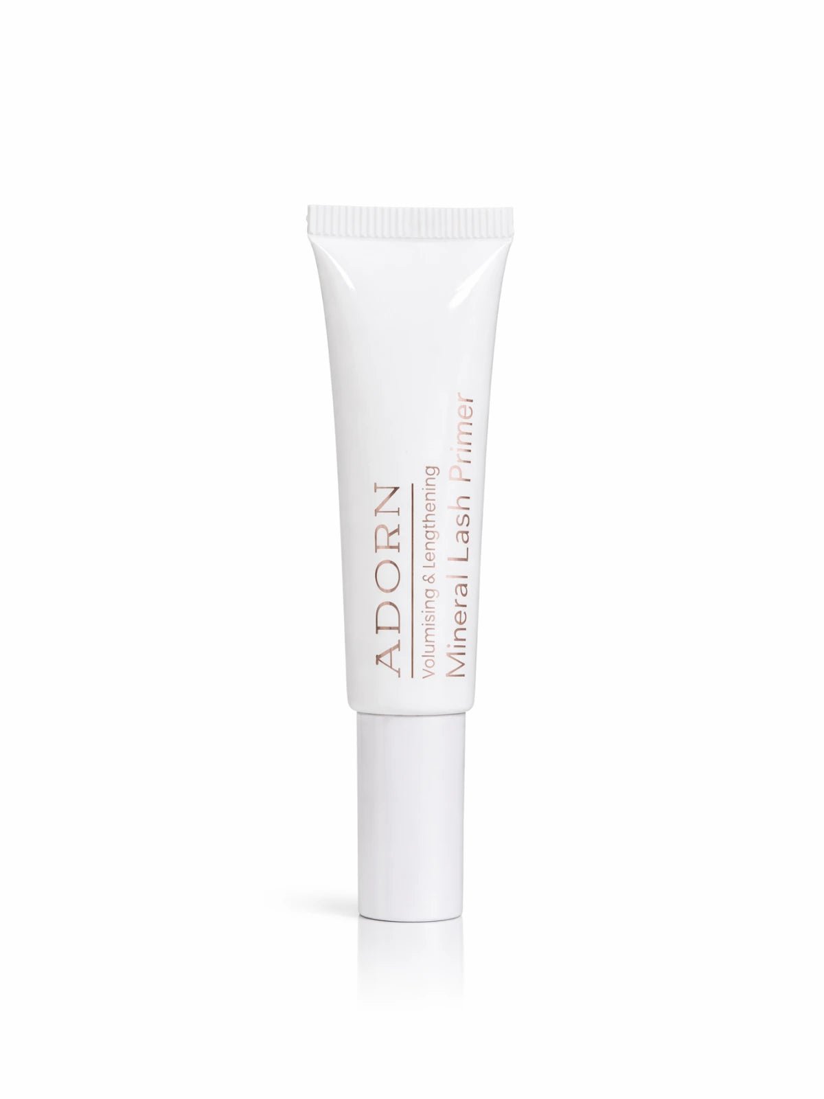 White tube of Adorn cosmetic mineral eyelash lengthening primer on a white background