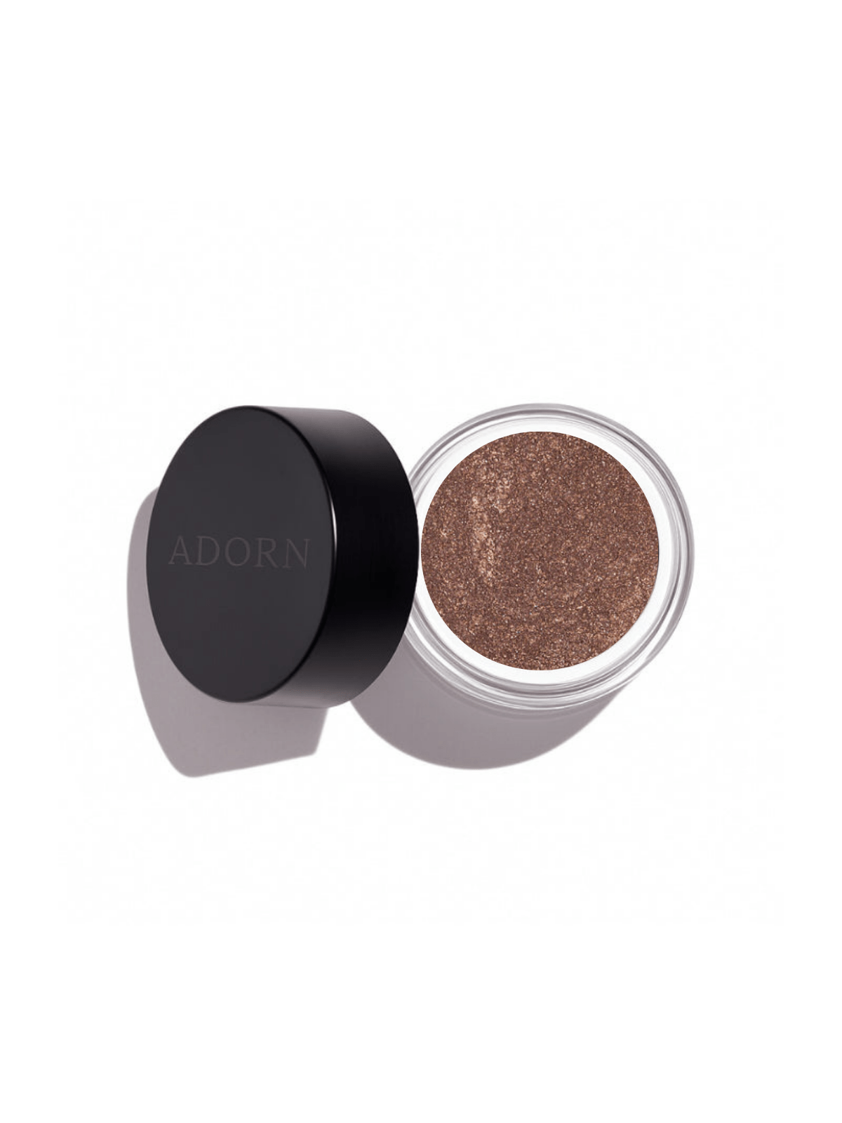 Open container of brown cosmetic loose mineral eyeshadow shade jasper, with shimmer with 'ADORN' branding on a white background