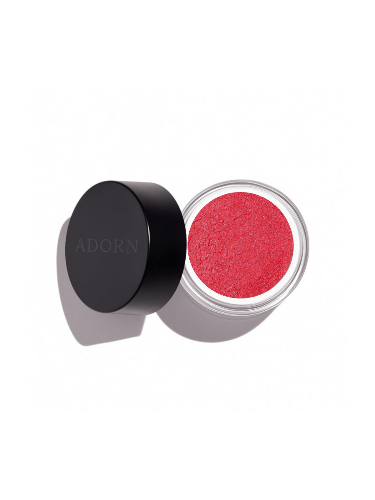 Open container of pink loose mineral eyeshadow shade melon with black lid on a white background, featuring the brand 'ADORN'.
