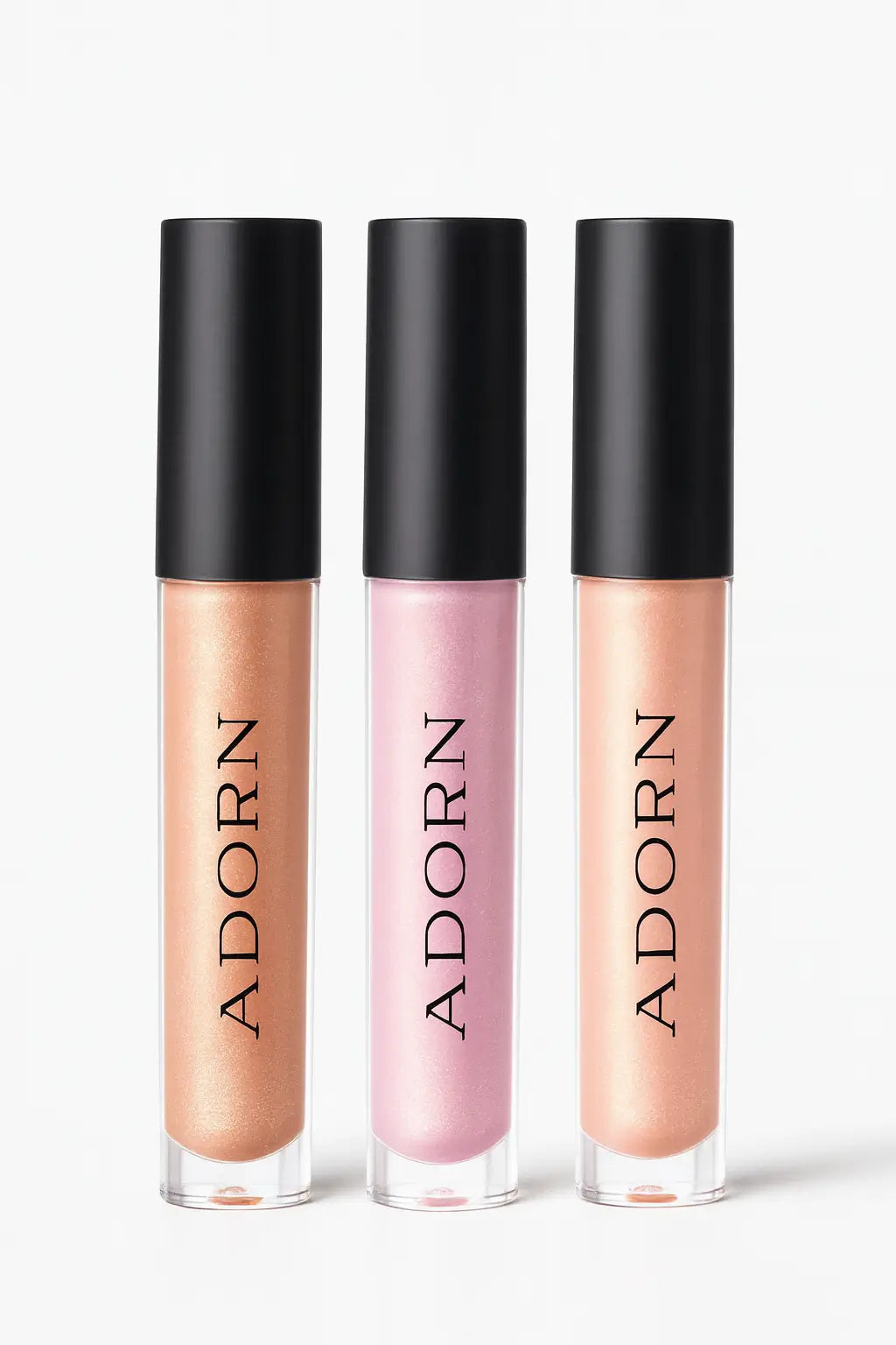 Three lip glosses with 'ADORN' branding on a white background with a red ribbon at the top.