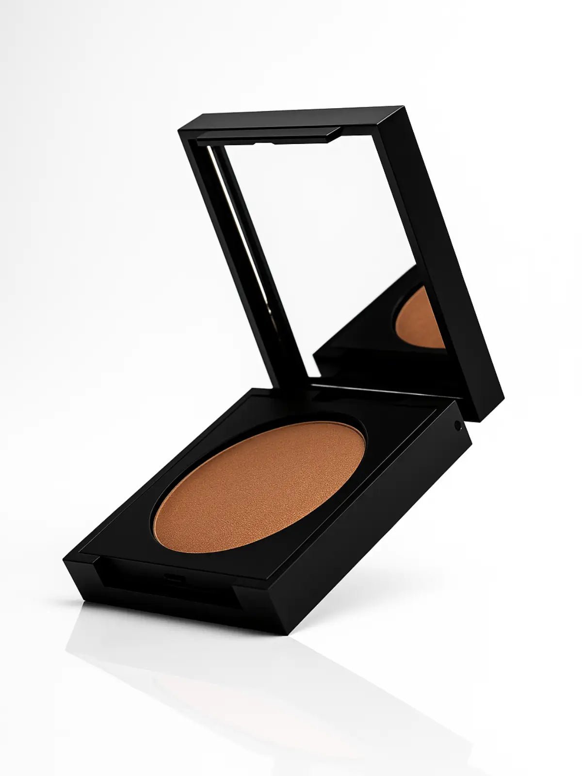 Pressed Mineral Bronzer | Refillable Compact in a black case on a white background