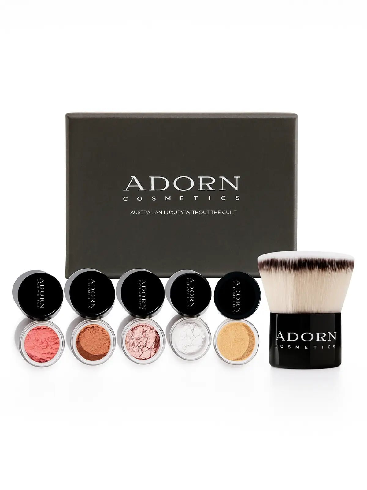 Adorn Cosmetics makeup set with six compact powders and a brush on a white background