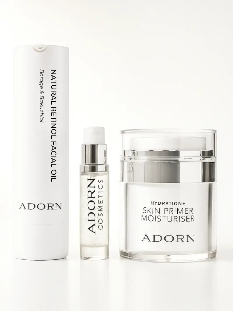 Adorn Cosmetics skincare products including facial oil, serum, and moisturizer on a white background