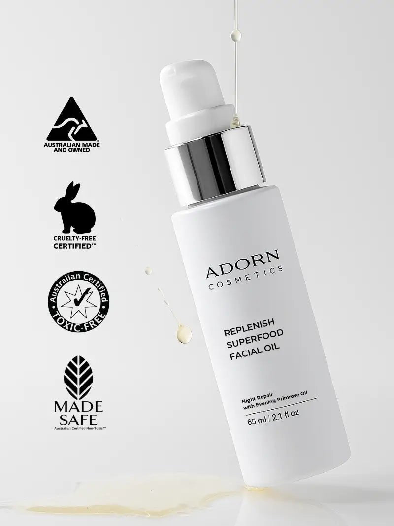 night facial oil bottle with certification logos on a white background