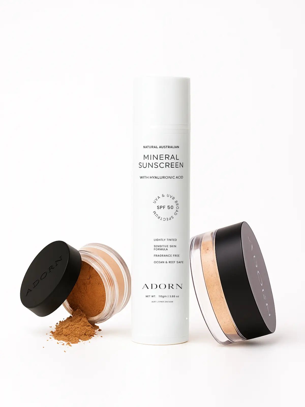 Adorn mineral sunscreen with mineral bronzer and mineral powder foundation container on a white background