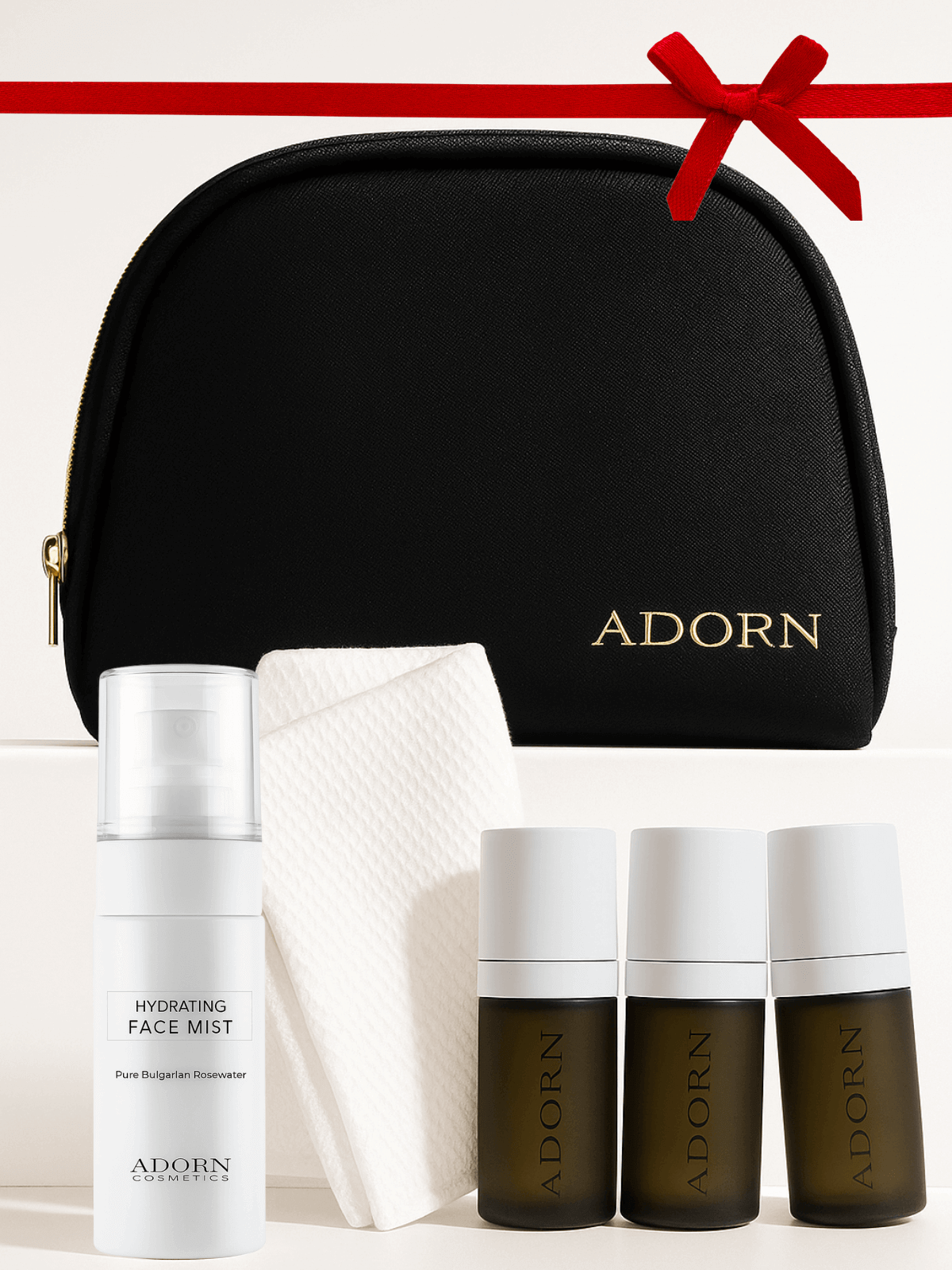 Adorn skincare gift set for women with black pouch on a white background