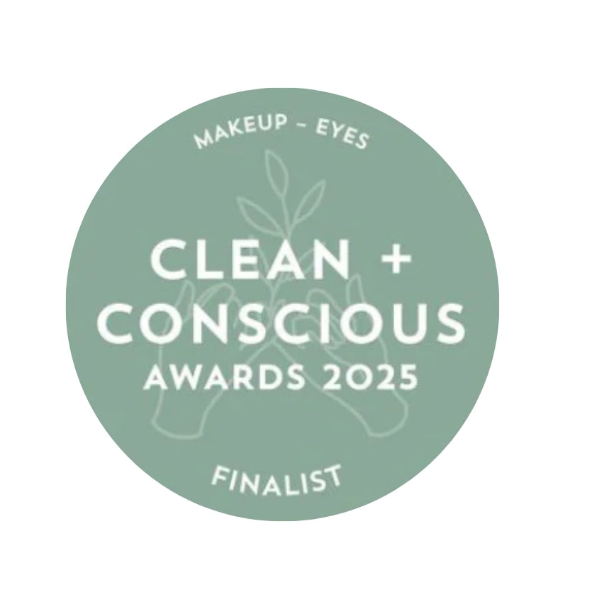Green circular badge with 'Clean + Conscious Awards 2025 Finalist' text on a white background