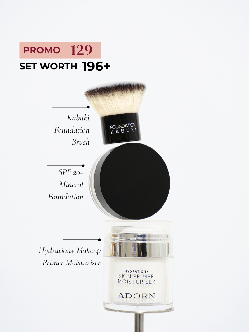 Makeup products including a kabuki foundation brush, SPF 20+ mineral foundation, and Adorn skin primer moisturiser on a white background.