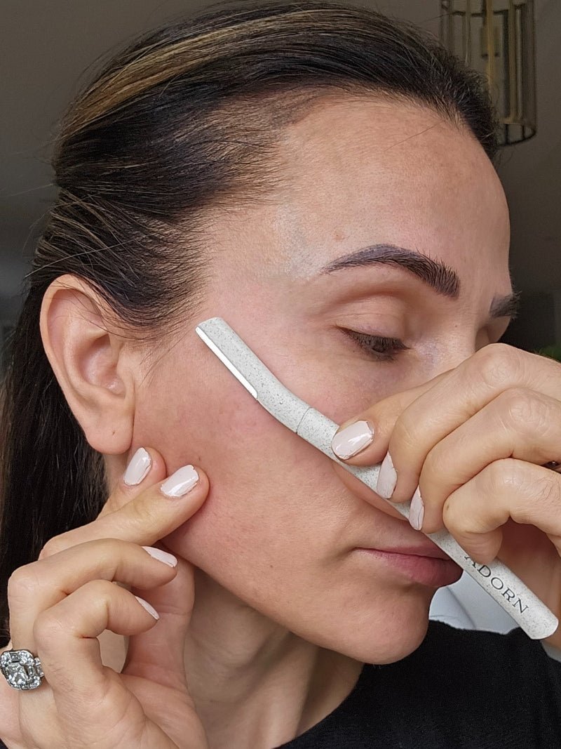 ADORN Biodegradable Dermablade for face on a woman's face
