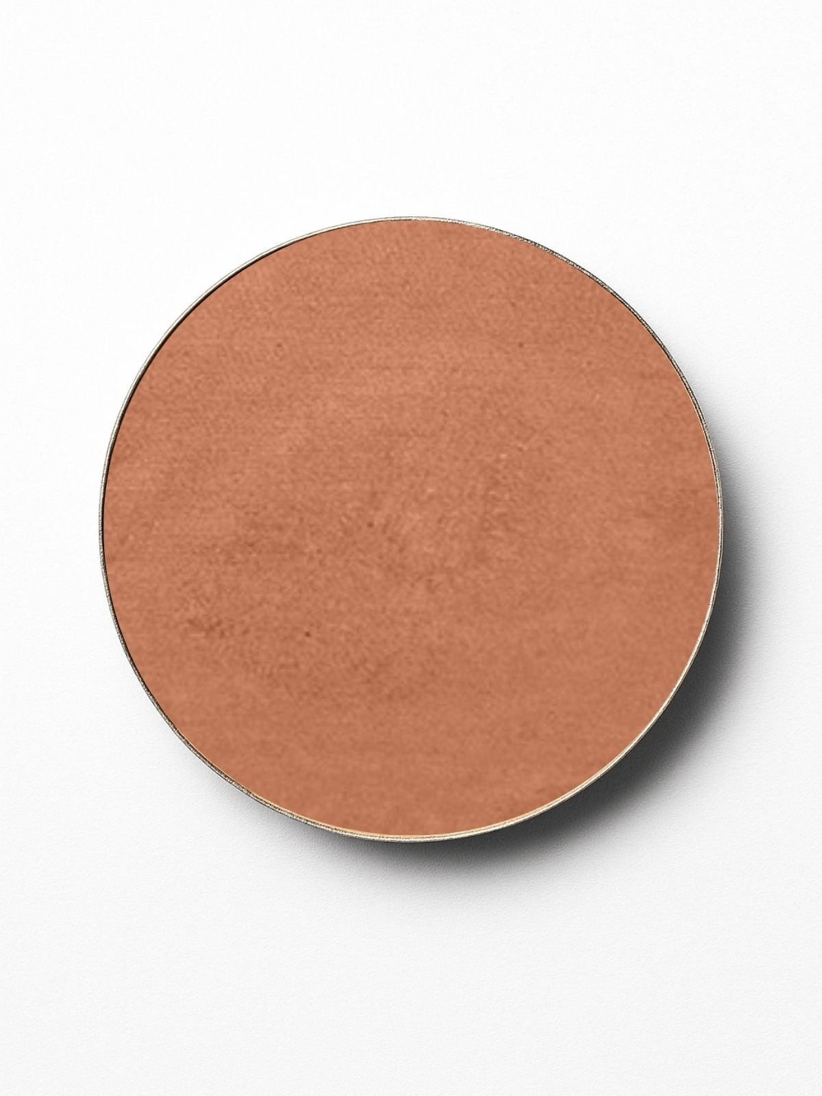 Round pressed mineral bronzer for contour on a white background