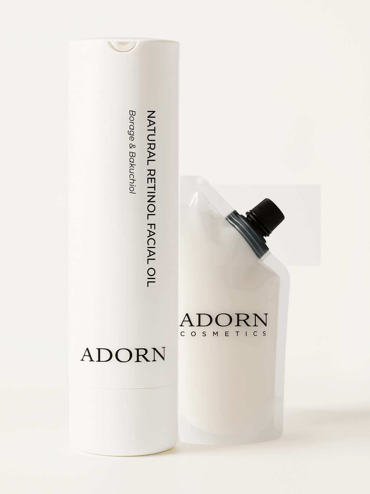 Adorn Cosmetics natural retinol facial oil bottle with refill pouch on a white background