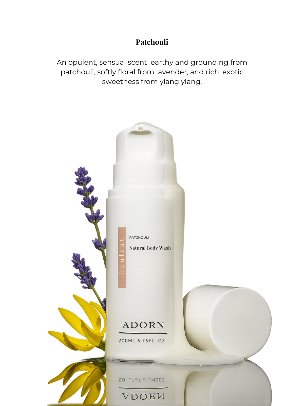 Natural body wash bottle with lavender and ylang ylang flowers on a white background