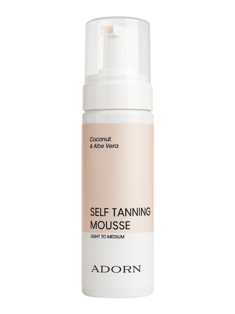 Natural self tanning mousse bottle with 'Adorn' branding on a white background.