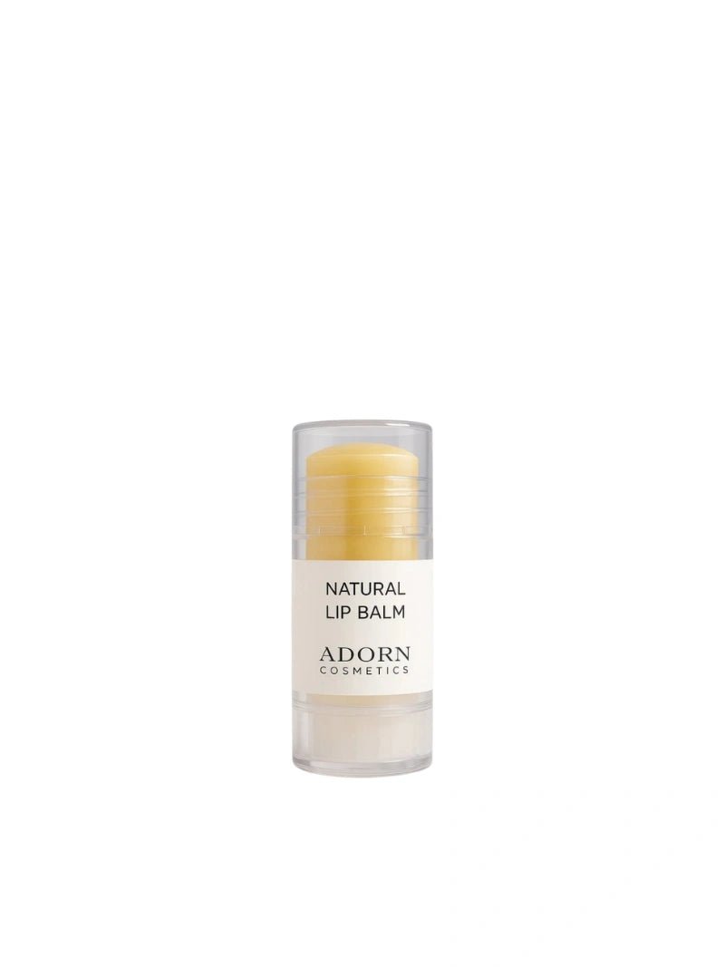 Lip balm container labeled 'Natural Lip Balm' by 'Adorn Cosmetics' on a white background