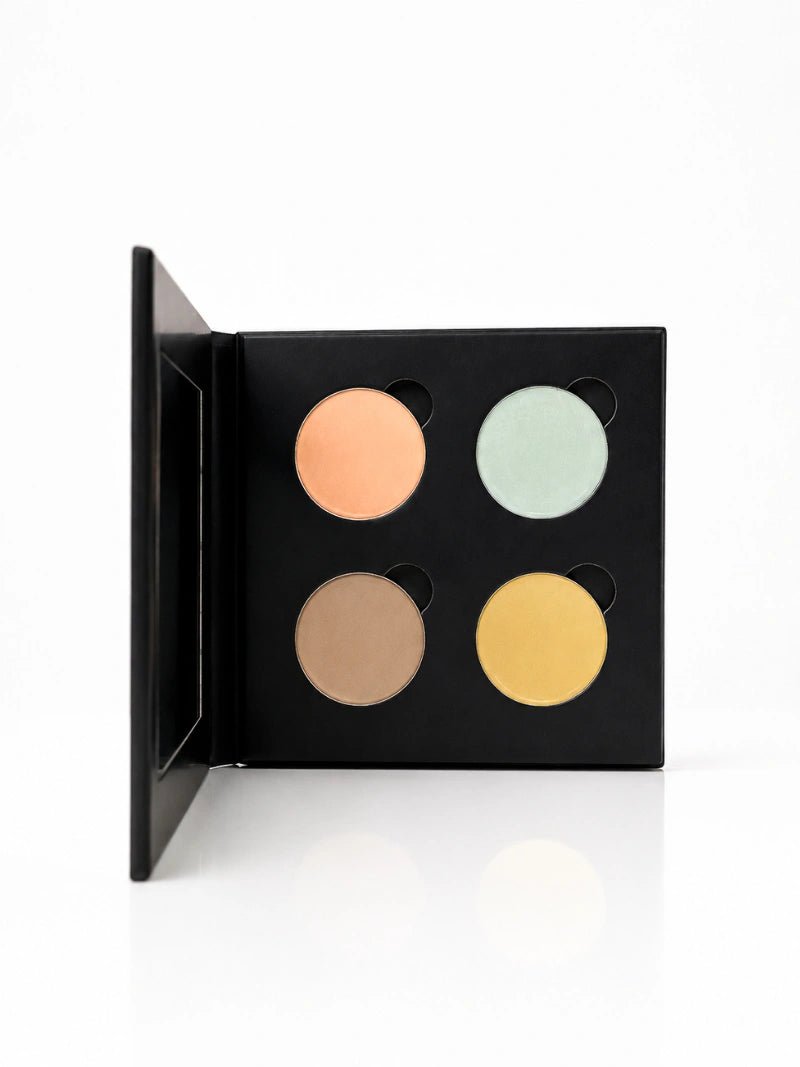 concealer palette with four colors on a white background