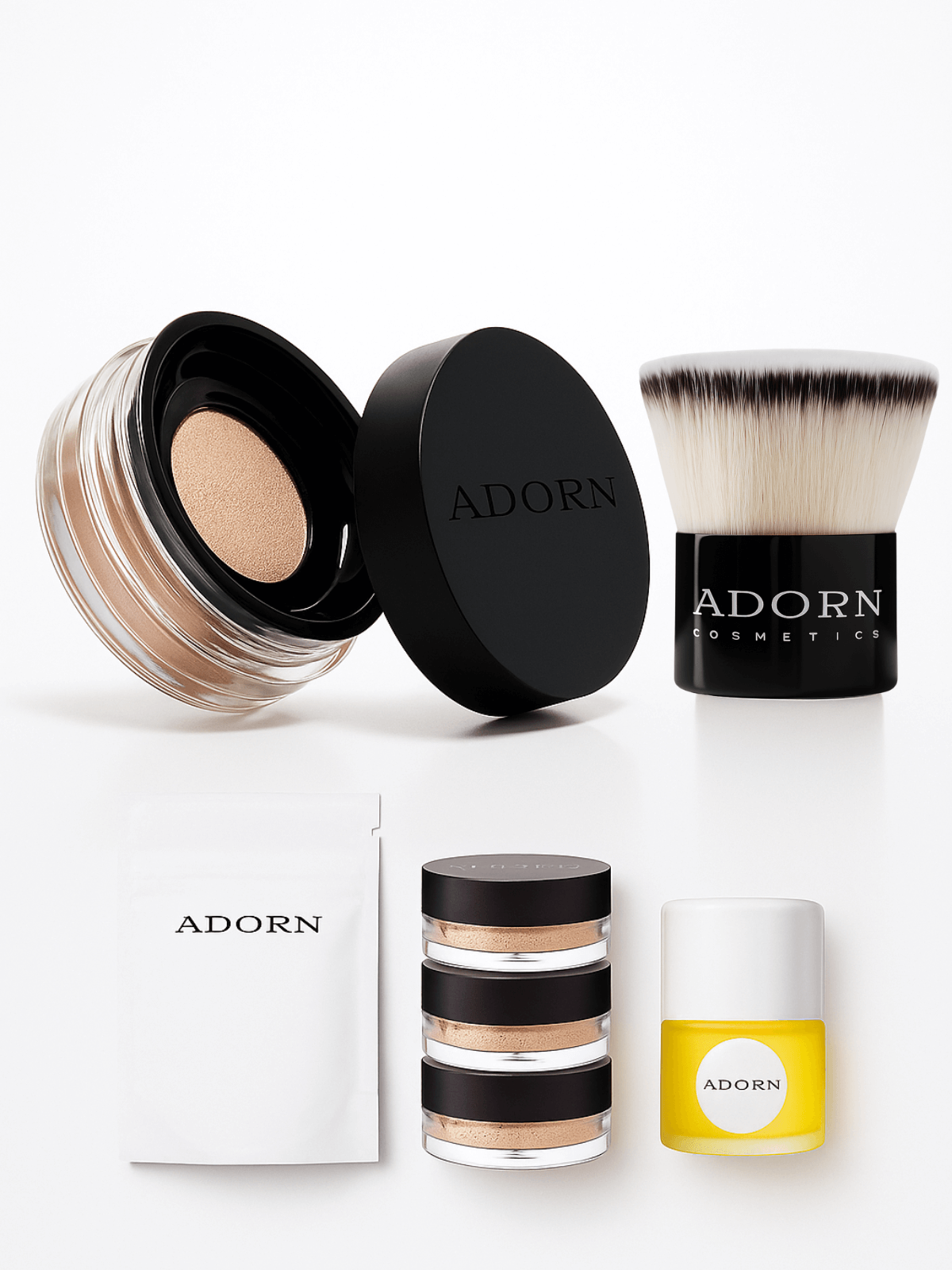 Makeup products with 'ADORN' branding on a white background
