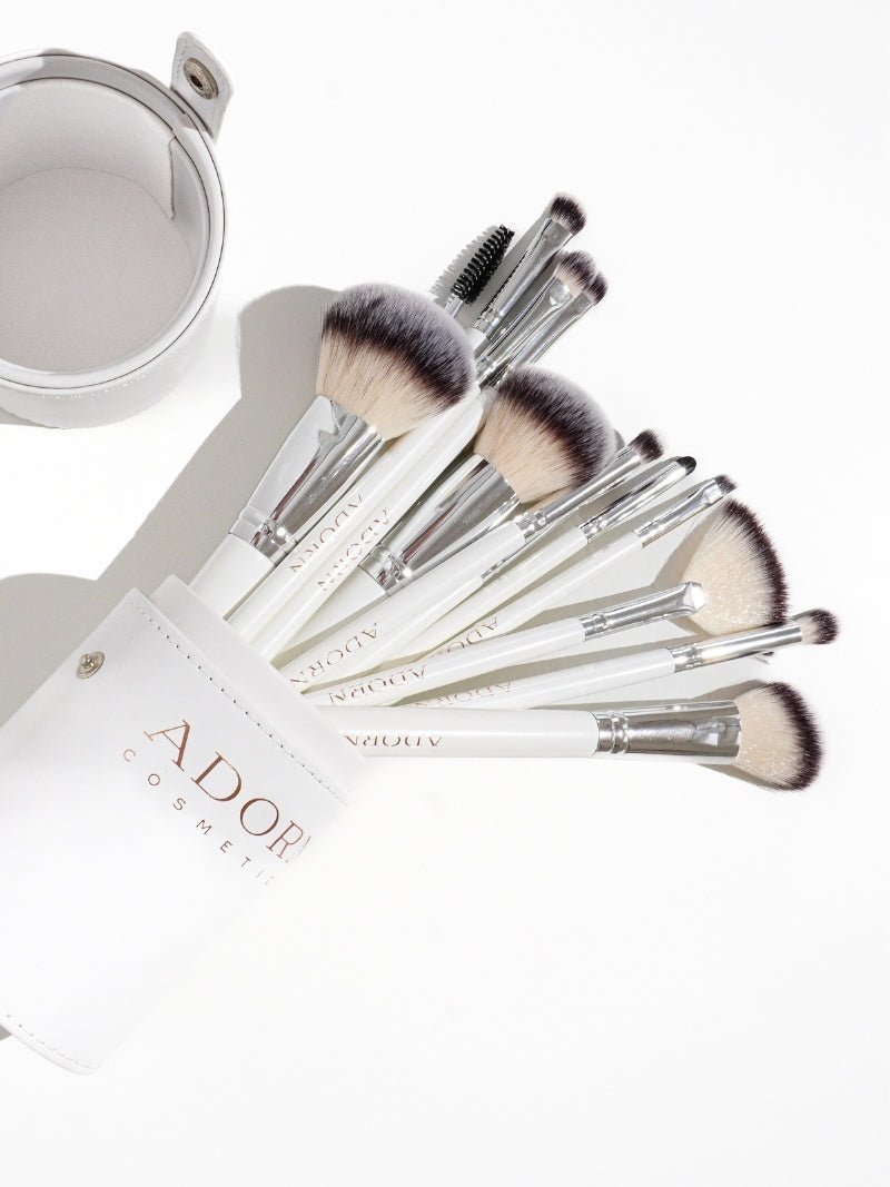 vegan makeup brushes set laying flat on a white background