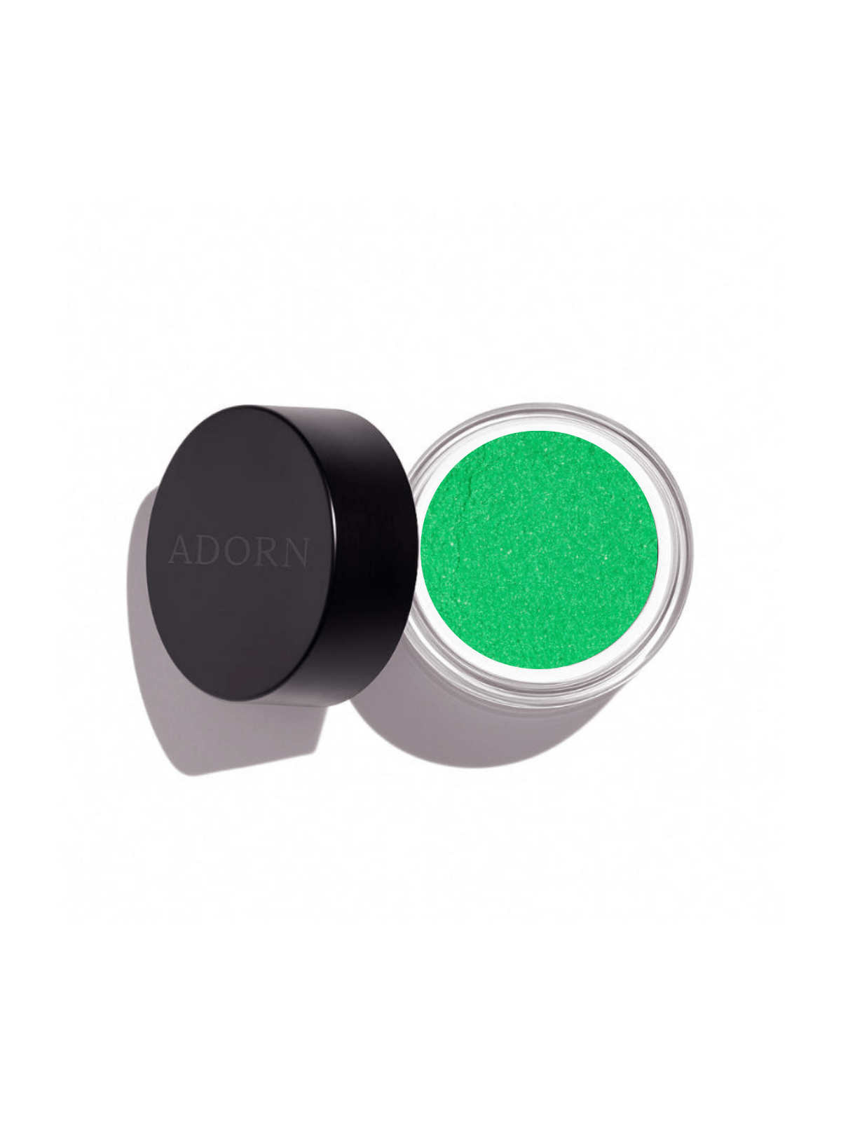 Green powder loose mineral eyeshadow shade apple  in a container with a black lid on a white background