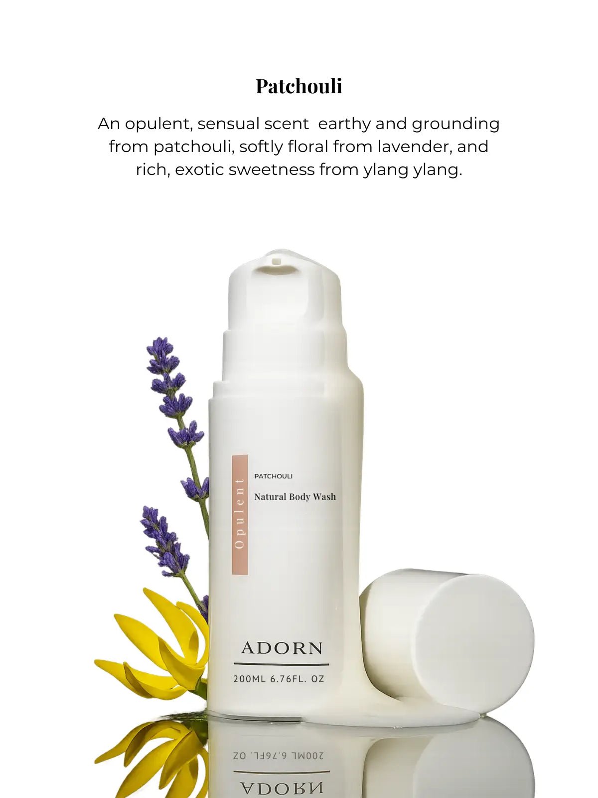 Adorn Patchouli natural body wash with lavender and ylang ylang flowers on a white background