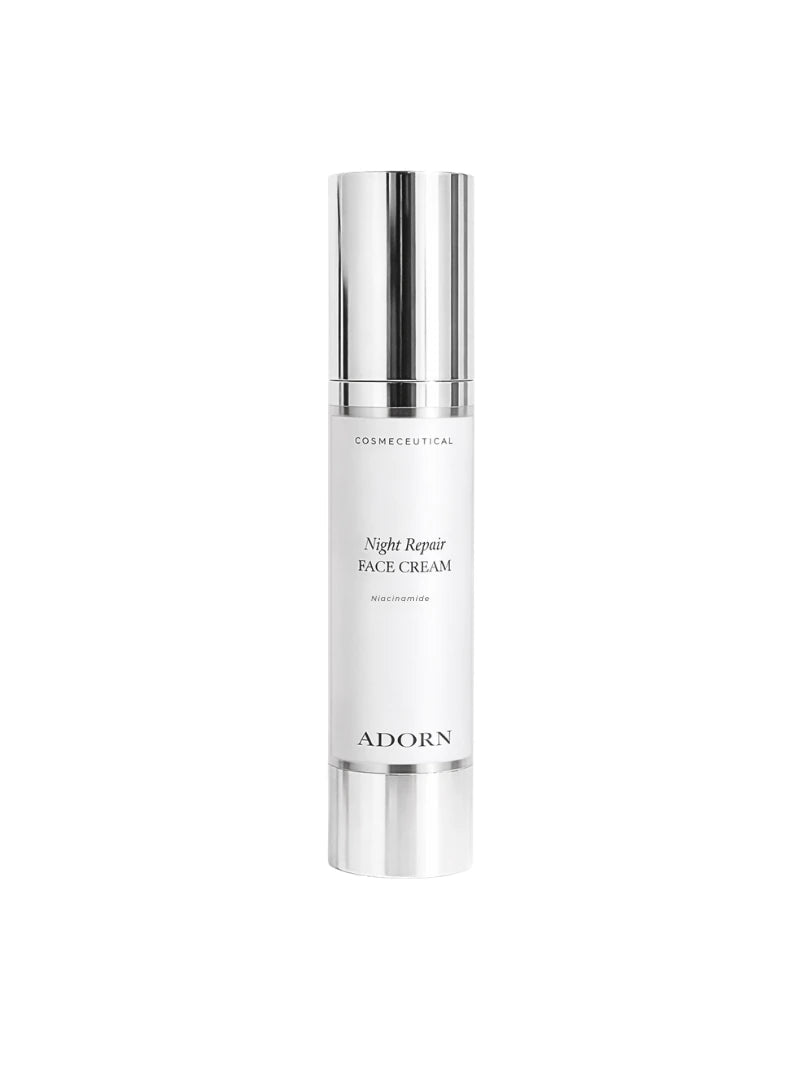 Skincare bottle labeled 'Night Repair Face Cream' by 'Adorn' on a white background