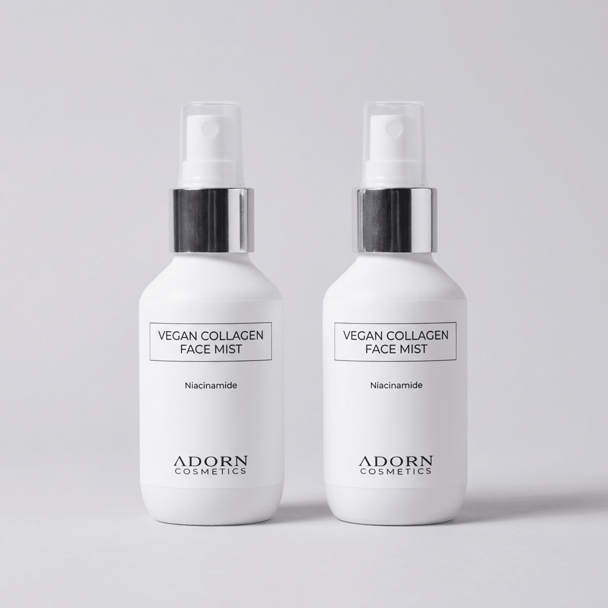 Two Adorn Collagen Repair Face Mist spray bottles in the pre-order bundle