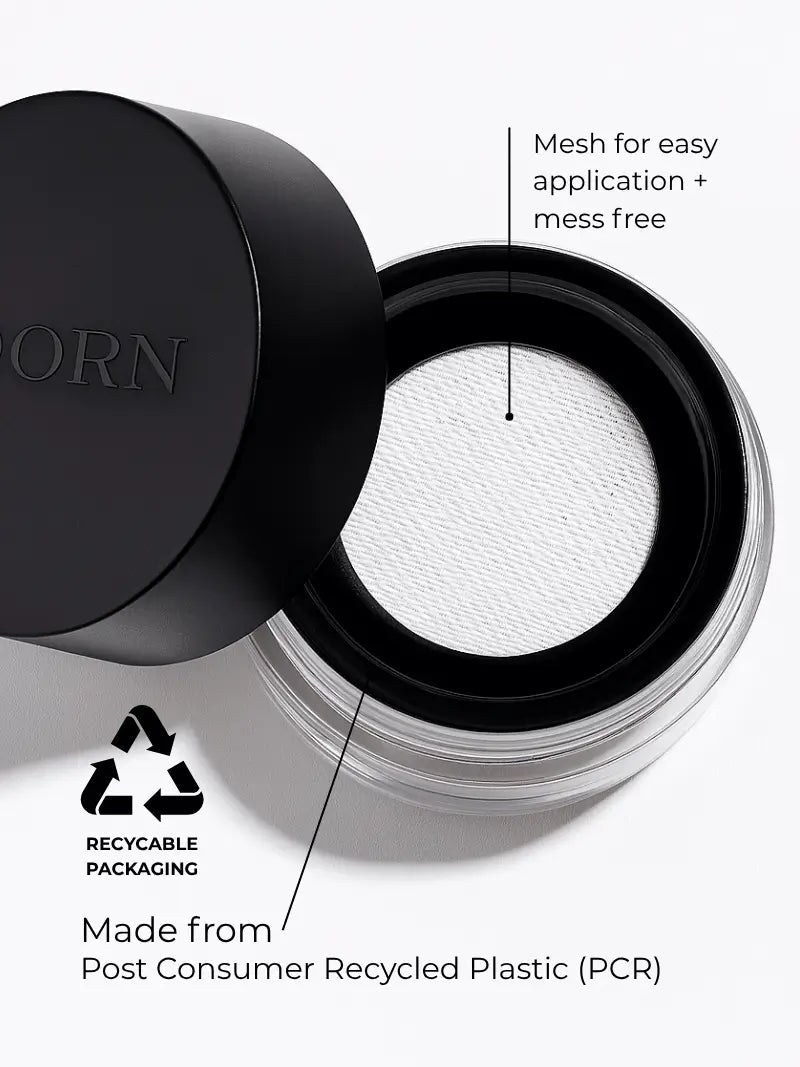Refillable mineral powder foundation  compact with black lid and mesh application feature, highlighting recyclable packaging.